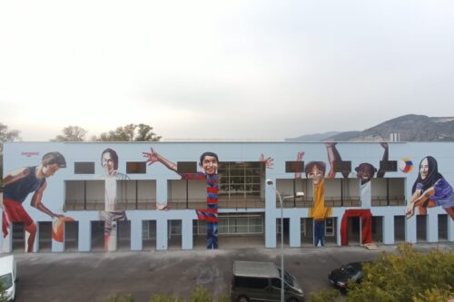 Palazzetto dello sport di Molinetto: murale per l’accoglienza